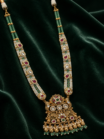 Rajnandini heritage Kundan long haar necklace with emerald green bead strands, pearl detailing and an ornate traditional pendant for weddings, festive occasions and silk sarees.