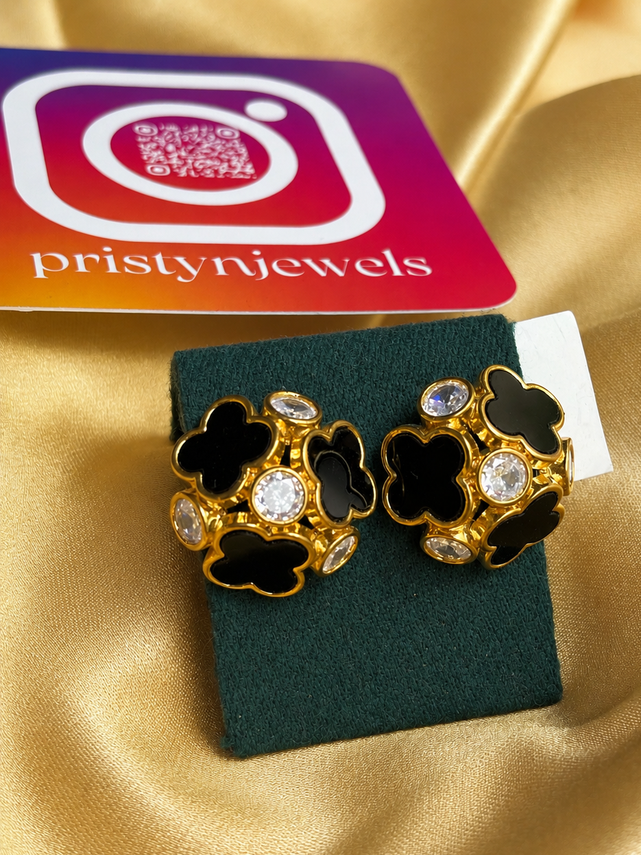 blk and gold earrings
