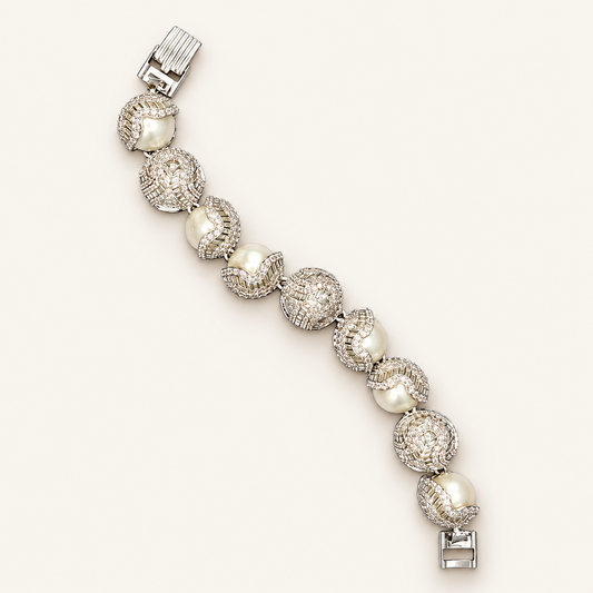 Pearl Wave Bracelet on an ivory background